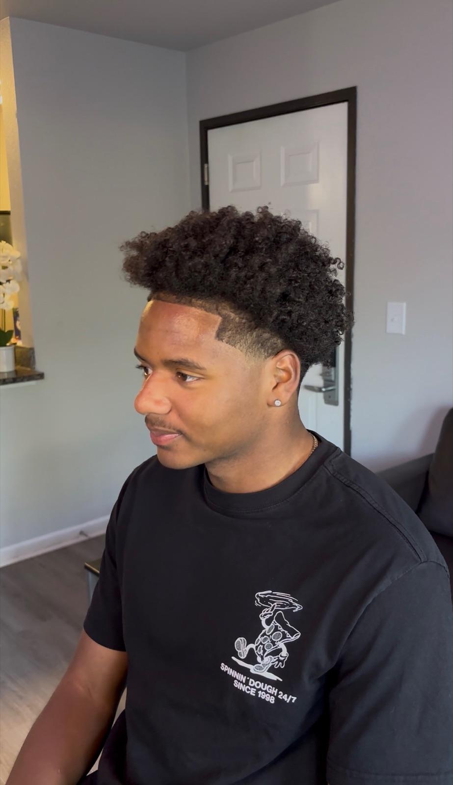 Fade haircut by Cuts by Scrap